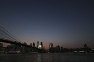 A general view of the skyline of lower Manhattan and the Brooklyn Bridge in Brooklyn, New York (Image via Getty)